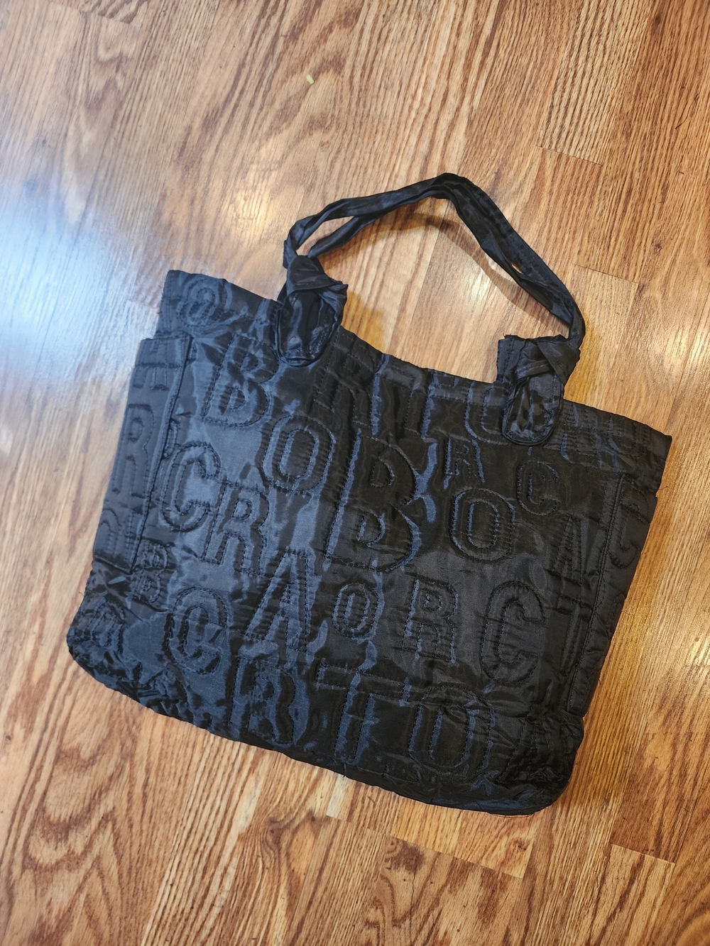 Black Quilted Nylon Tote Bag with Textured Logo Pattern